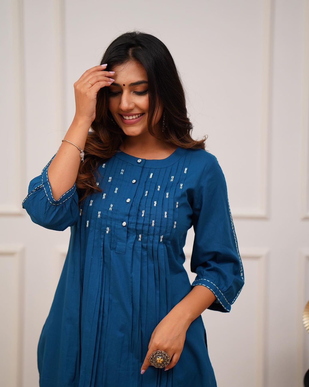 Upgrade your office wear wardrobe with this classy *teal blue kurti pant with beautiful manual tagai & button work detailing for all day comfort and trendy look