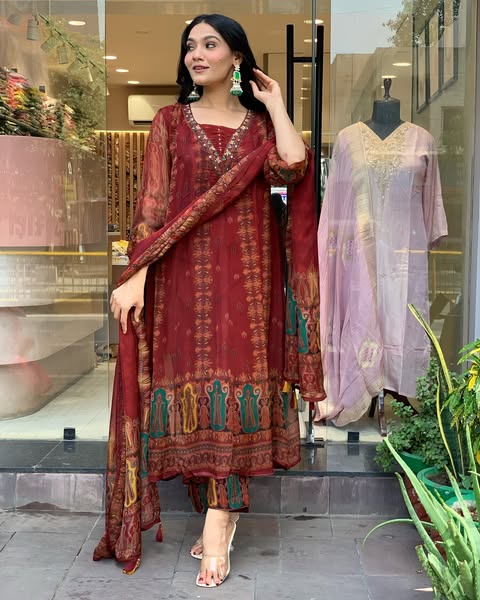 Beautiful pure premium chiffon digital printed Anarkali set with handwork on neck it has attached lining paired up with santoon slik pant and Organza digital printed dupatta sets(SWRED04)