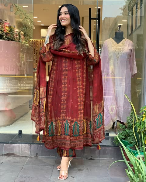 Beautiful pure premium chiffon digital printed Anarkali set with handwork on neck it has attached lining paired up with santoon slik pant and Organza digital printed dupatta sets(SWRED04)
