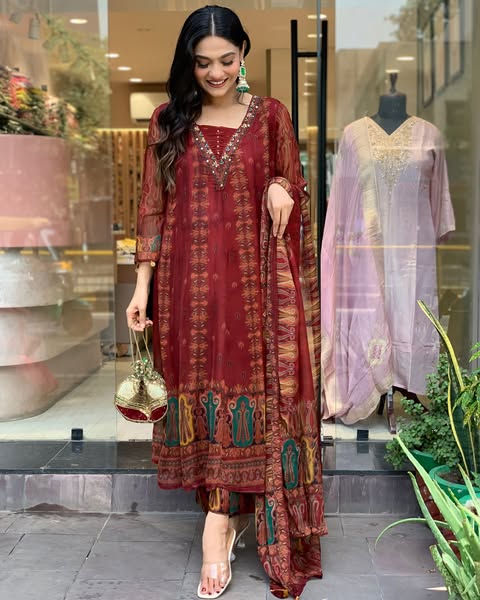 Beautiful pure premium chiffon digital printed Anarkali set with handwork on neck it has attached lining paired up with santoon slik pant and Organza digital printed dupatta sets(SWRED04)