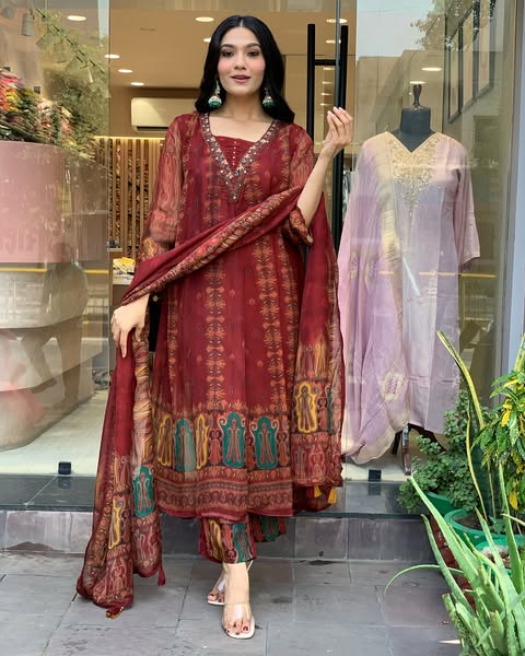 Beautiful pure premium chiffon digital printed Anarkali set with handwork on neck it has attached lining paired up with santoon slik pant and Organza digital printed dupatta sets(SWRED04)