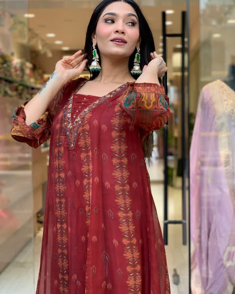 Beautiful pure premium chiffon digital printed Anarkali set with handwork on neck it has attached lining paired up with santoon slik pant and Organza digital printed dupatta sets(SWRED04)