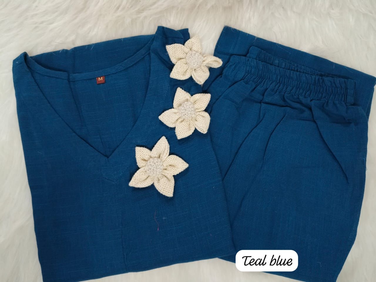 Premium jute flowers embroidery on side which give the look of premium casual look in summer(SWC31)
