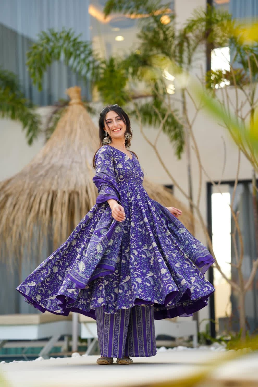 Introducing a stunning purple cotton Anarkali suit set paired with a soft mulmul duppata.