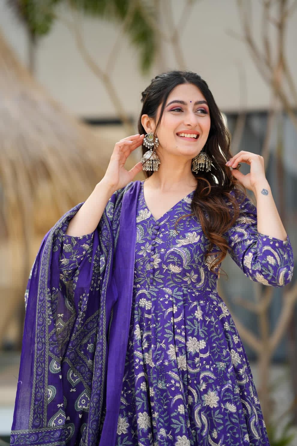 Introducing a stunning purple cotton Anarkali suit set paired with a soft mulmul duppata.