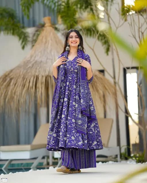 Introducing a stunning purple cotton Anarkali suit set paired with a soft mulmul duppata.