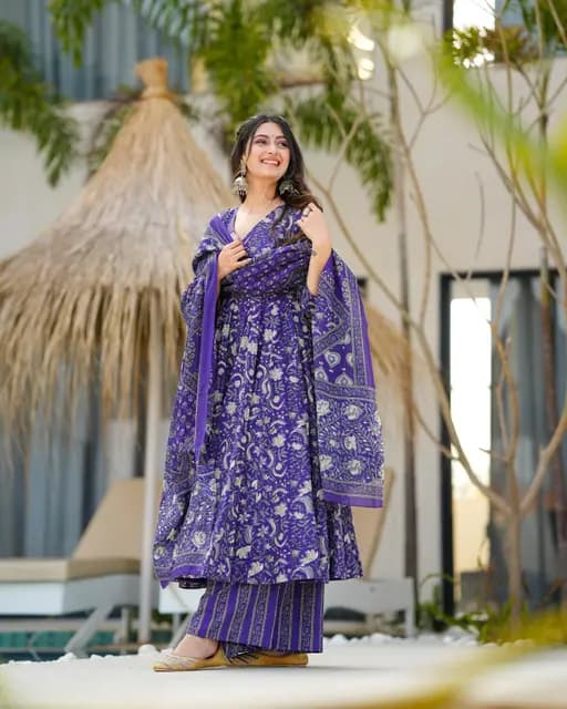 Introducing a stunning purple cotton Anarkali suit set paired with a soft mulmul duppata.