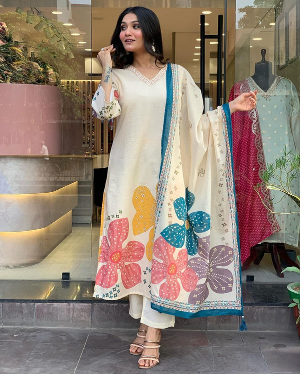 Launching Summer Cool, Comfortable And Attractive Softest Muslin Suit Set Which Is Beautifully Decorated With Hand Embroidery And Thread Work. It Is Paired With Matching Pants And Dupatta