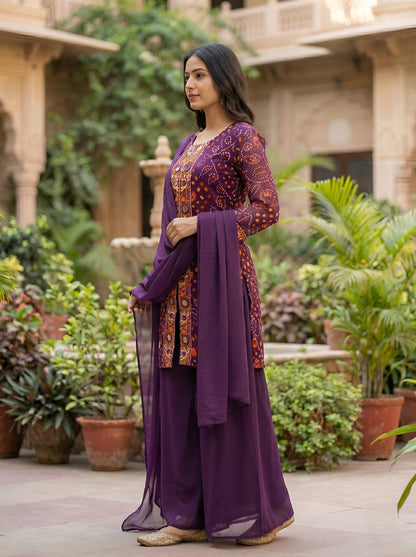 A Rich Purple And Pink Bandhani Printed Plazo set Featuring An Embroidered Front Panel, Flowy Matching Bottoms and A Sheer Dupatta For An Elegant Ethnic Look. (NFRD01)