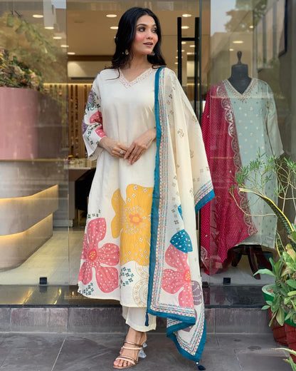 Launching Summer Cool, Comfortable And Attractive Softest Muslin Suit Set Which Is Beautifully Decorated With Hand Embroidery And Thread Work. It Is Paired With Matching Pants And Dupatta(SWRED18)