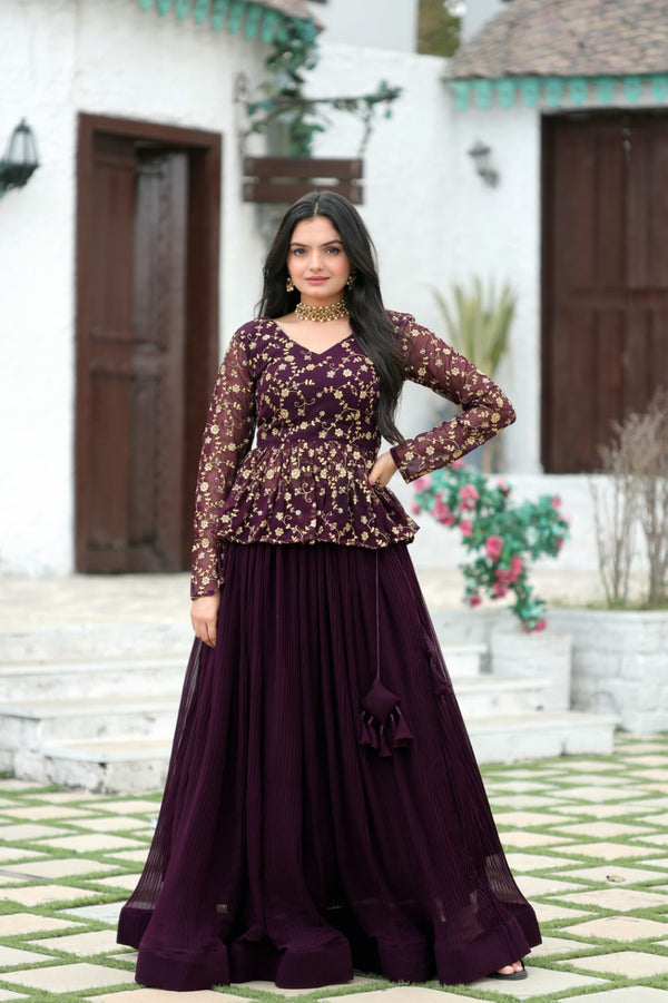 Magenta Faux Georgette Lehenga With Sequence Embroidered Peplum Blouse