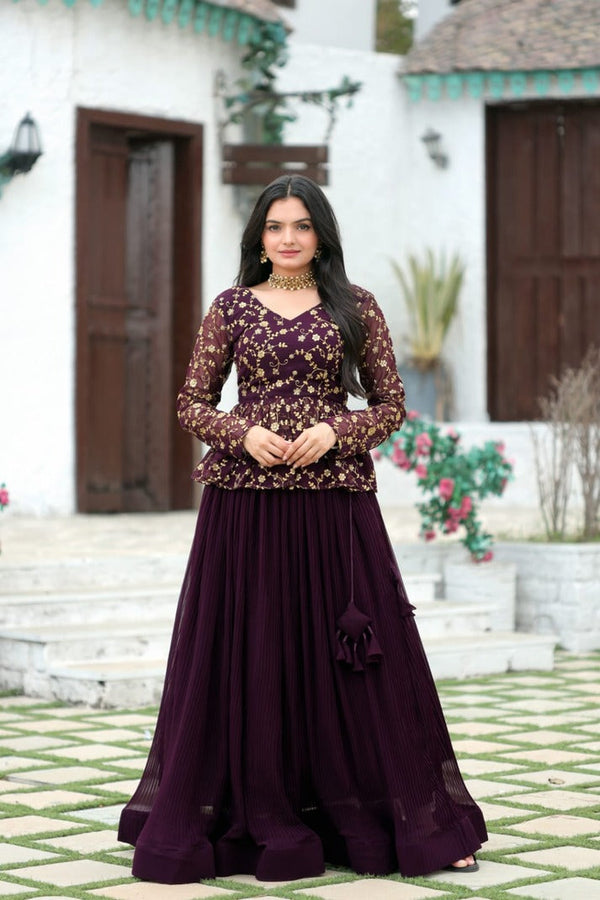 Magenta Faux Georgette Lehenga With Sequence Embroidered Peplum Blouse