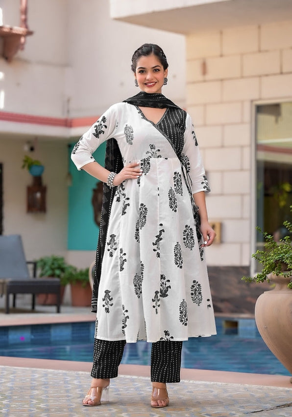 For a Festive gathering, you'll can opt for black white ANGRAKHA set which is decorated with finest self .It is paired with matching dupatta