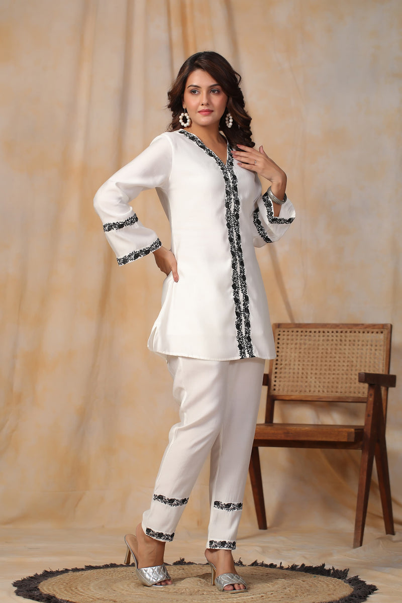 The Glorious Heavy Rayon Cord-Set comprises kurta and Pants adorned with exquisite embroidery on Sleeves ,Pants and kurta on the front.