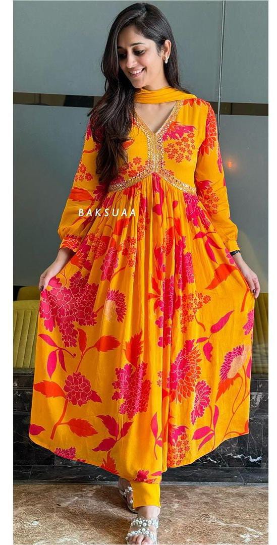Launching Yellow With Red Flourish Pattern Aliya Cut Gown Adorne With Intricate Dori Work, Moti Work (Pearl) and Daliya Work which enhances the Neckline Luxurious Look and Feel.🧡💛🧡💛🧡💛🧡💛🧡