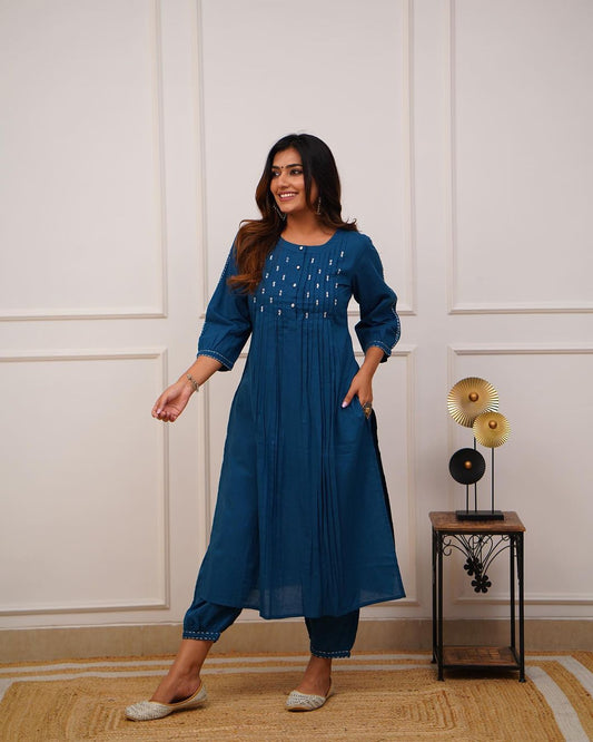 Upgrade your office wear wardrobe with this classy *teal blue kurti pant with beautiful manual tagai &amp; button work detailing for all day comfort and trendy look