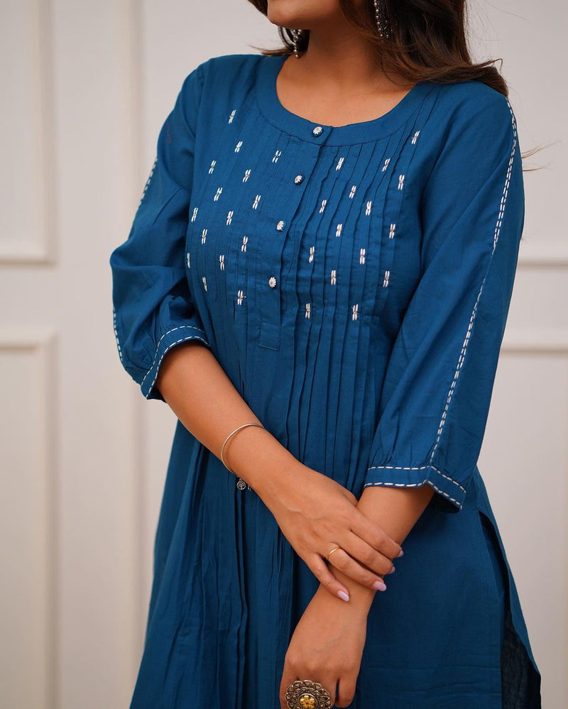 Upgrade your office wear wardrobe with this classy *teal blue kurti pant with beautiful manual tagai &amp; button work detailing for all day comfort and trendy look