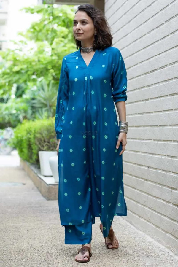 Elevate your style with this charming blue Cotton kurta and palazzo set. The hand-done bandhni print adds a touch of traditional elegance to the outfit*❤️