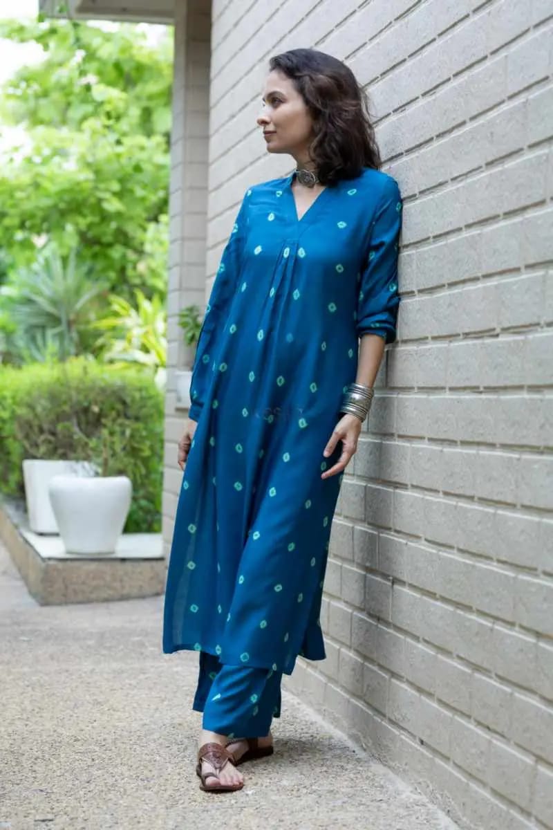 Elevate your style with this charming blue Cotton kurta and palazzo set. The hand-done bandhni print adds a touch of traditional elegance to the outfit*❤️