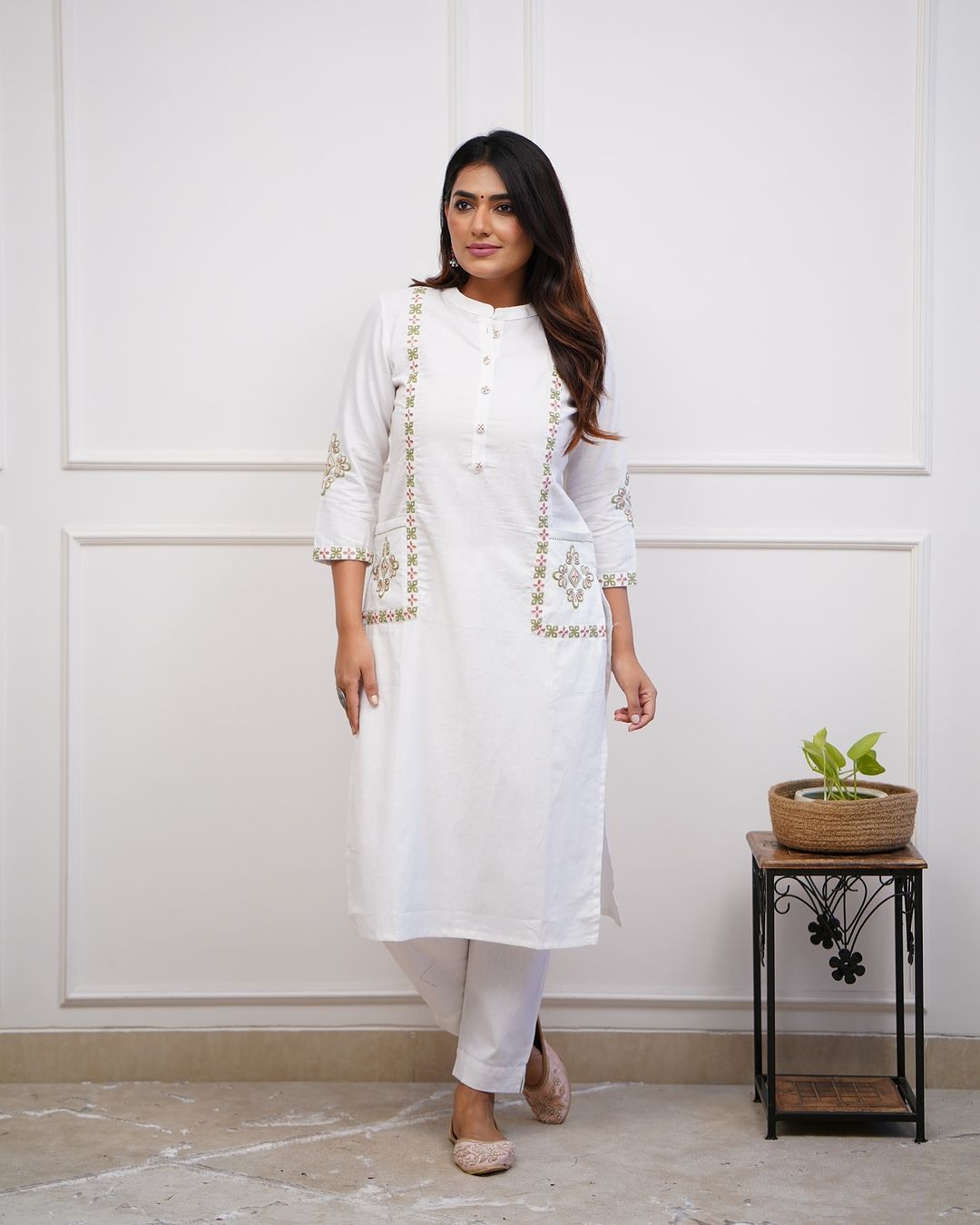 Upgrade your office wear wardrobe with this classykurti pant with embroidery button work detailing for all day comfort and trendy look