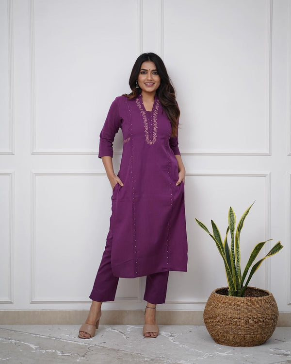 Pure cotton pleated pattern kurta with heavy embroided panels and sequence work..