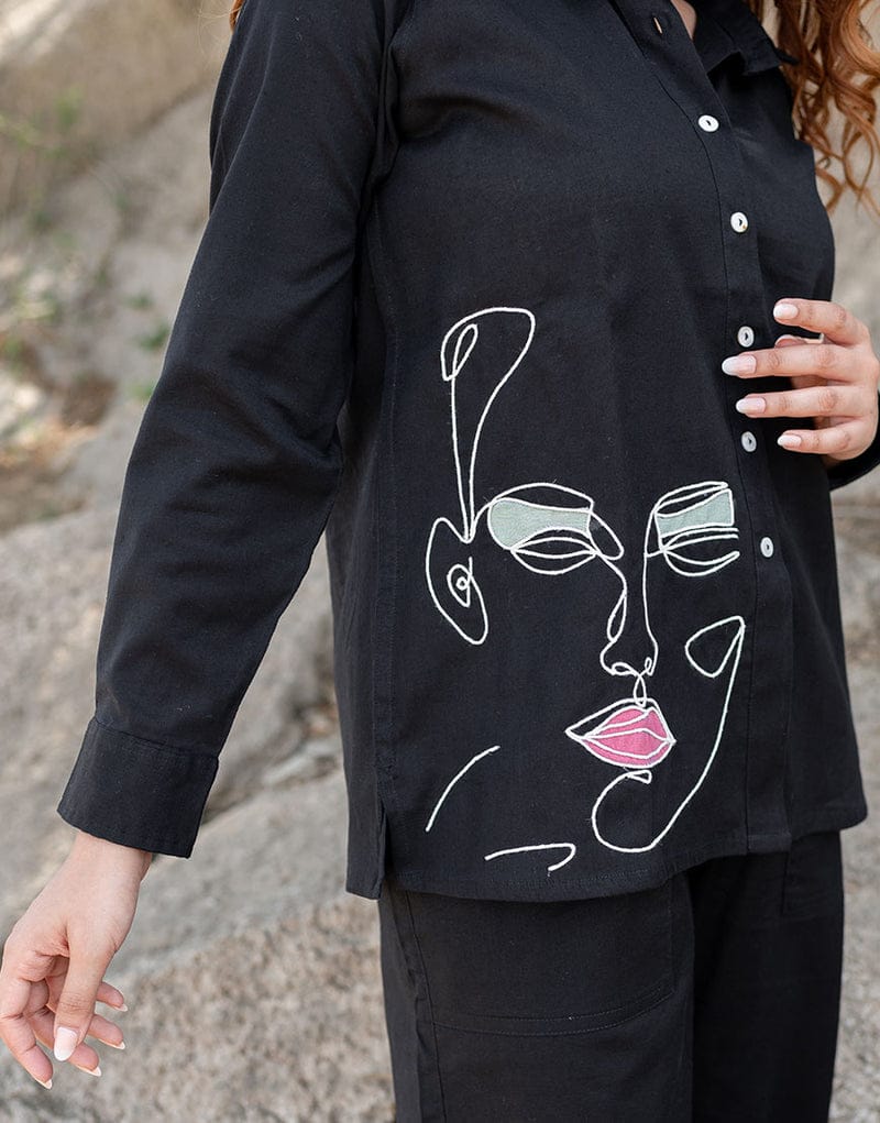 Get artsy with this quirky Black shirt! Made from hand-loomed cotton fabric, it features a white  Black  color