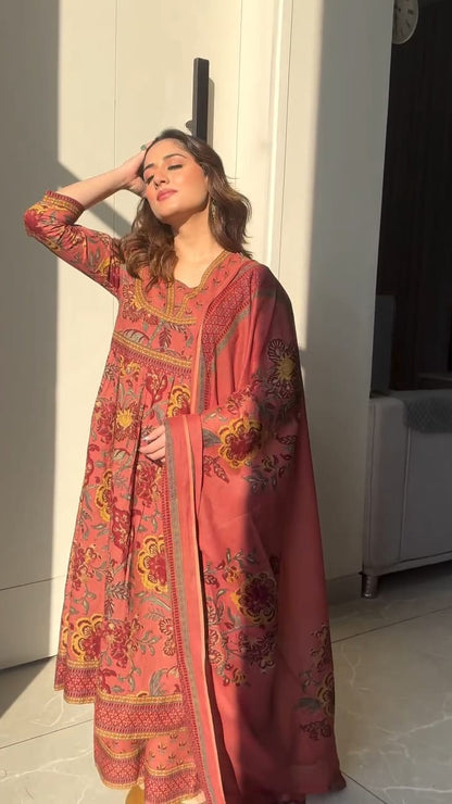Premium cotton Anarkali suit set with hand work detailing on yoke paired with matching pant and full dupatta.(SWRED60)