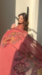 Premium cotton Anarkali suit set with hand work detailing on yoke paired with matching pant and full dupatta.