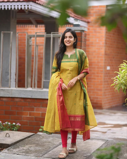 Crafted from pure Kanchi cotton, this elegant yellow ensemble is designed with love and rooted in South Indian cultural artistry. (RRRD11)