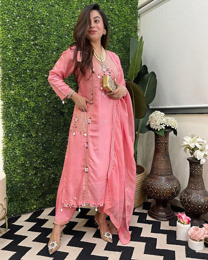 Featuring beautifully Crafted Pure Roman Silk Suits in beautiful Colours, which are decorated with finest sequence & Cowry Embroidery Work (RRRD02)