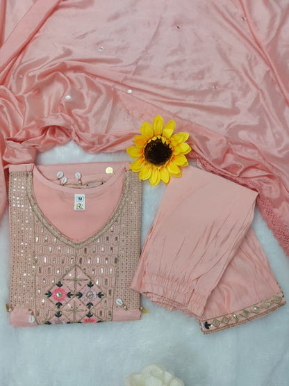 Featuring beautifully Crafted Pure Roman Silk Suits in beautiful Colours, which are decorated with finest sequence & Cowry Embroidery Work (RRRD02)