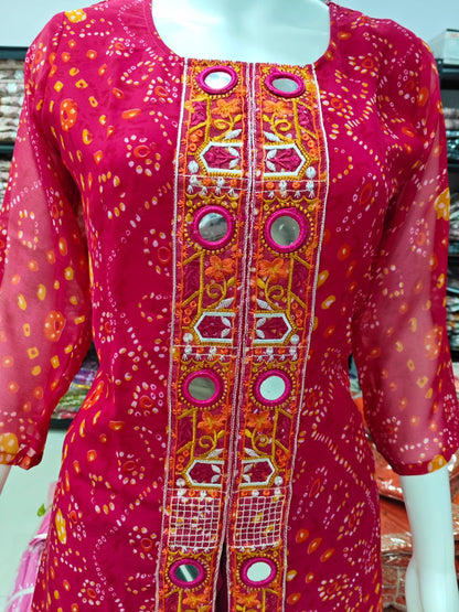 A Rich Purple And Pink Bandhani Printed Plazo set Featuring An Embroidered Front Panel, Flowy Matching Bottoms and A Sheer Dupatta For An Elegant Ethnic Look. (NFRD01)