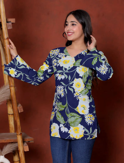 Elevate your ethnic wardrobe with this chic and vibrant fuchsia pink blue skay green  kurti. Featuring a striking white lily print, this piece is designed for the modern woman who loves a mix of classic charm and edgy details.(RRRD40)