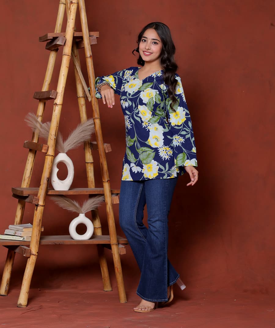 Elevate your ethnic wardrobe with this chic and vibrant fuchsia pink blue skay green  kurti. Featuring a striking white lily print, this piece is designed for the modern woman who loves a mix of classic charm and edgy details.(RRRD40)