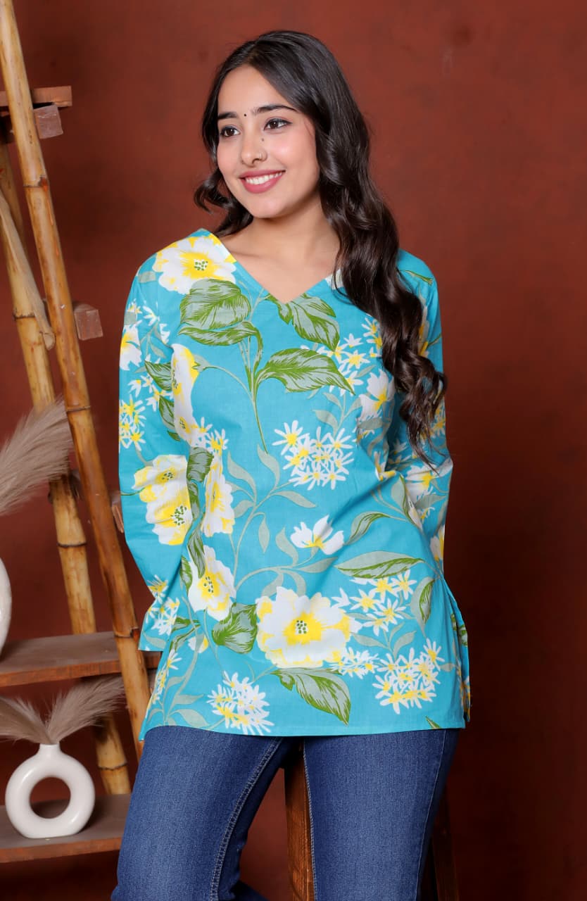 Elevate your ethnic wardrobe with this chic and vibrant fuchsia pink blue skay green  kurti. Featuring a striking white lily print, this piece is designed for the modern woman who loves a mix of classic charm and edgy details.(RRRD40)