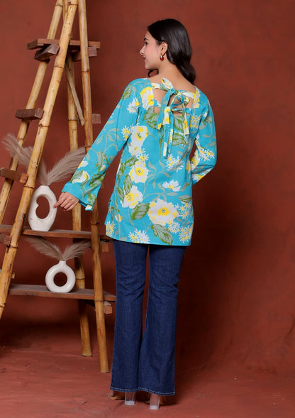 Elevate your ethnic wardrobe with this chic and vibrant fuchsia pink blue skay green  kurti. Featuring a striking white lily print, this piece is designed for the modern woman who loves a mix of classic charm and edgy details.(RRRD40)