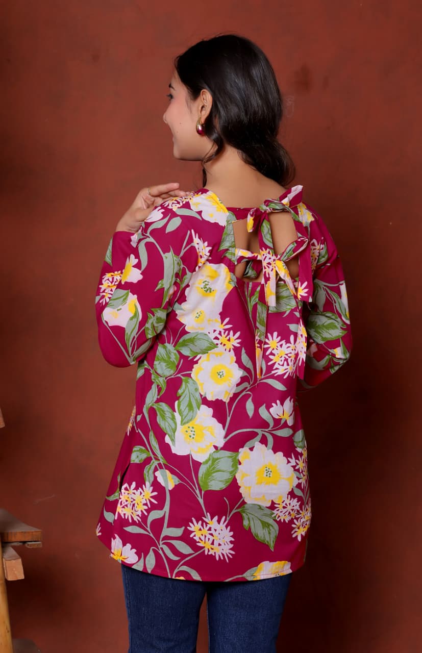 Elevate your ethnic wardrobe with this chic and vibrant fuchsia pink blue skay green  kurti. Featuring a striking white lily print, this piece is designed for the modern woman who loves a mix of classic charm and edgy details.(RRRD40)