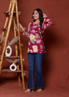 Elevate your ethnic wardrobe with this chic and vibrant fuchsia pink blue skay green  kurti. Featuring a striking white lily print, this piece is designed for the modern woman who loves a mix of classic charm and edgy details.(RRRD40)