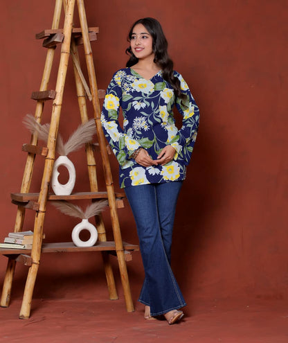 Elevate your ethnic wardrobe with this chic and vibrant fuchsia pink blue skay green  kurti. Featuring a striking white lily print, this piece is designed for the modern woman who loves a mix of classic charm and edgy details.(RRRD40)