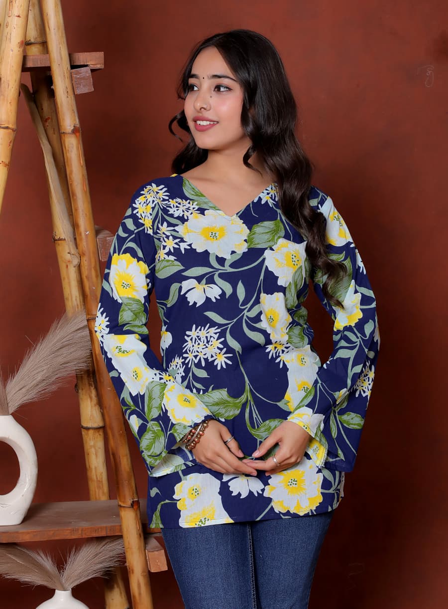 Elevate your ethnic wardrobe with this chic and vibrant fuchsia pink blue skay green  kurti. Featuring a striking white lily print, this piece is designed for the modern woman who loves a mix of classic charm and edgy details.(RRRD40)