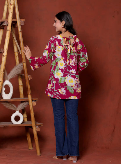 Elevate your ethnic wardrobe with this chic and vibrant fuchsia pink blue skay green  kurti. Featuring a striking white lily print, this piece is designed for the modern woman who loves a mix of classic charm and edgy details.(RRRD40)