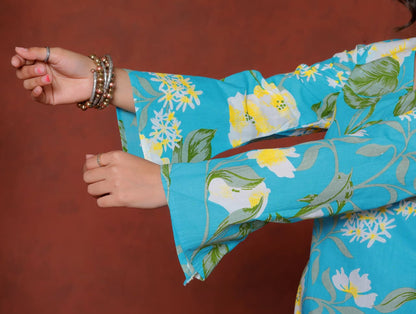 Elevate your ethnic wardrobe with this chic and vibrant fuchsia pink blue skay green  kurti. Featuring a striking white lily print, this piece is designed for the modern woman who loves a mix of classic charm and edgy details.(RRRD40)