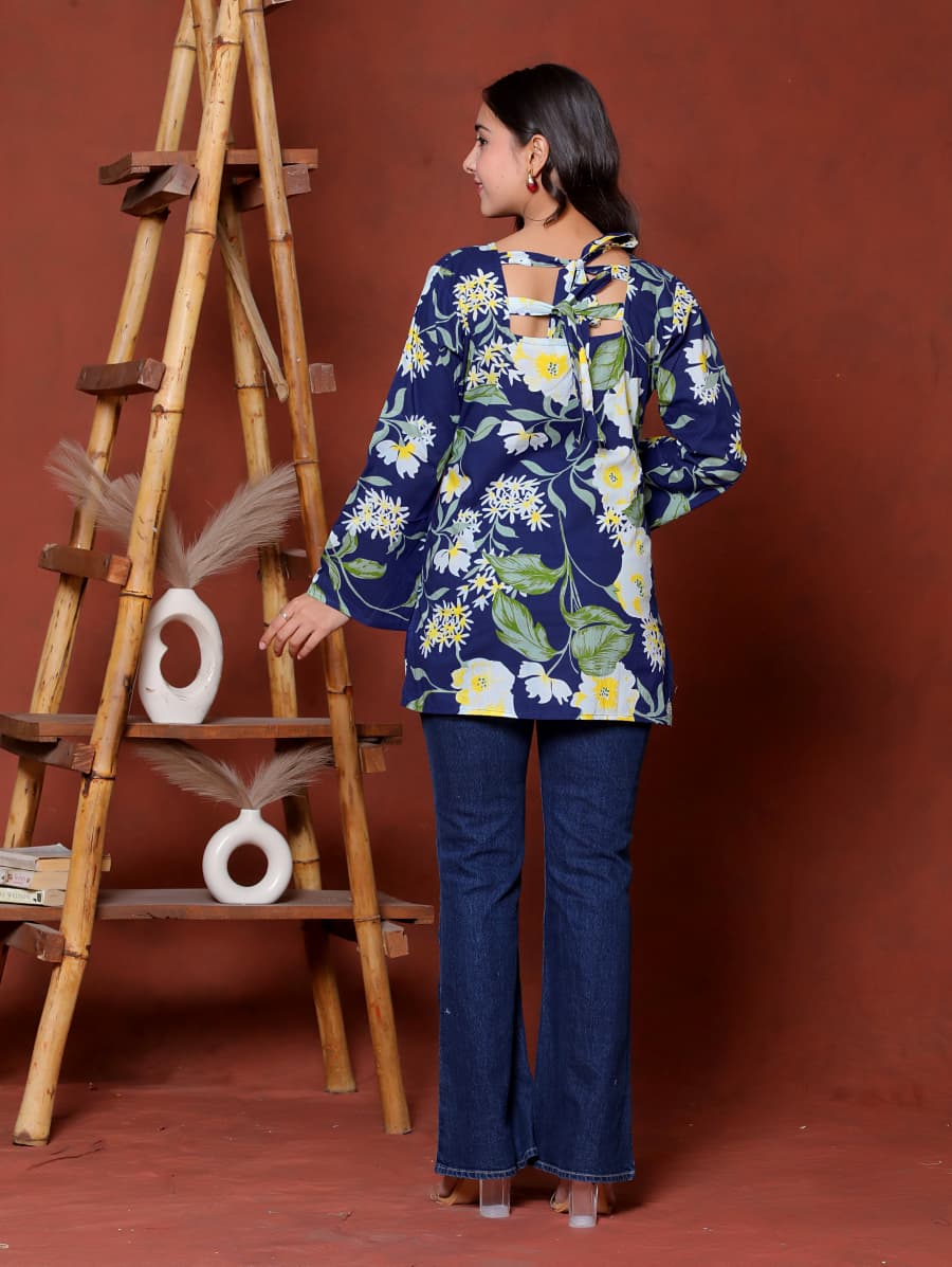 Elevate your ethnic wardrobe with this chic and vibrant fuchsia pink blue skay green  kurti. Featuring a striking white lily print, this piece is designed for the modern woman who loves a mix of classic charm and edgy details.(RRRD40)