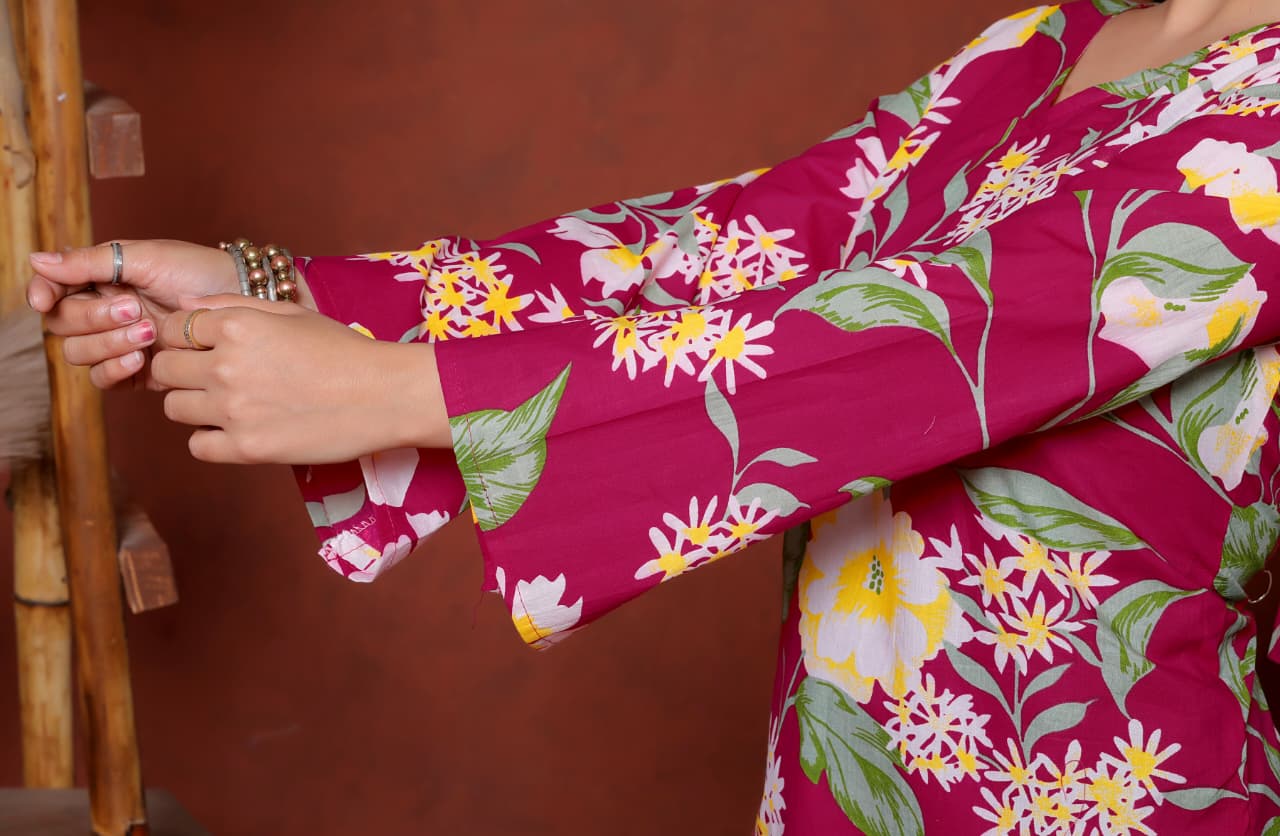 Elevate your ethnic wardrobe with this chic and vibrant fuchsia pink blue skay green  kurti. Featuring a striking white lily print, this piece is designed for the modern woman who loves a mix of classic charm and edgy details.(RRRD40)